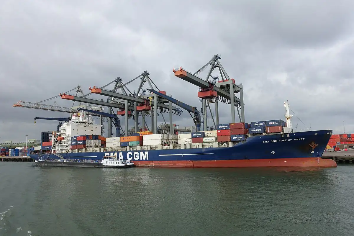 A container ship at a container terminal in the Port of Rotterdam, October 2016. Archive photo.